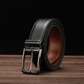 Close-up of a premium black leather business belt with a gunmetal textured buckle - 105 / Textured Black Brown Side Brown Stitching