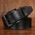 Macro view of black genuine leather belt with matte black buckle on dark wood background - 105cm / Black