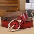Vintage red leather belt for women with embossed floral pattern and gold round buckle - Red / 100cm