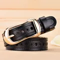 Black leather belt for women featuring sunflower cutouts and a gold oval buckle - 105cm / Black