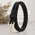 Women's thin black leather belt with gold heart buckle and rhinestone detail decoration - 105cm / Black