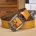Ceinture vintage en cuir jaune gingembre avec gaufrage papillon et boucle argentée - 105cm / Kaki