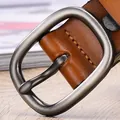 Brown leather belt with vintage oval metal buckle and detailed stitching for women - 105cm / Camel