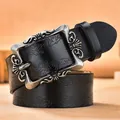 Vintage black embossed leather belt for women featuring an antique silver floral buckle - 105 / Silver Buckle - Black