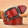 Vintage dark red leather belt with embossed floral patterns and carved silver buckle - Silver Buckle - Red