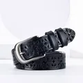 Elegant black leather belt for women featuring floral hollow cutouts and a silver metal buckle - 105cm / Black