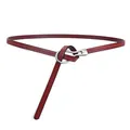 Women's burgundy slim leather belt featuring a silver U-shaped metal buckle and knotted style - Red