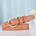 Elegant camel brown leather belt for women featuring a round golden metal buckle - Camel Strap with Gold Buckle