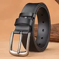 Classic men's black leather belt with silver matte pin buckle on wooden background - 105cm / Black