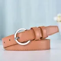 Light brown leather belt for women featuring a silver round metal buckle and fine stitching - Camel Strap with Silver Buckle