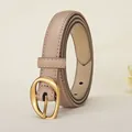 Women's slim taupe leather belt with vintage golden round buckle on a linen background - 105cm / Khaki
