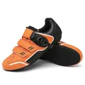 Oranje en zwarte fietsschoenen met klittenbandsluiting en ratelsluitingsysteem - 36 / Rubber / Oranje
