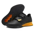 Black weightlifting shoes with dual straps and high-traction honeycomb heel support - EU 39 / Black & Gold
