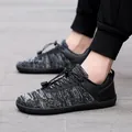 Αναπνέοντα παπούτσια barefoot με πλεκτό επάνω μέρος σε μαύρο-γκρι και ελαστικά κορδόνια - Μαύρο και Γκρι