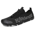 Unisex black quick-dry water shoes with honeycomb pattern and non-slip rubber soles - EU 35 / 1811 Black
