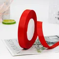 Roll of 1.5cm red grosgrain ribbon with ribbed texture for DIY gift wrapping and crafts - Red