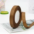 Brown 1.5cm grosgrain ribbon on decorative card for DIY crafts and gift wrapping - Chocolate