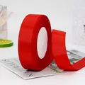 Roll of bright red grosgrain ribbon with ribbed texture for gift wrapping and DIY crafts - Red (26#)