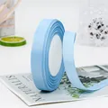 Light blue grosgrain ribbon roll with distinct ribbed texture for gift wrapping DIY - Aqua Blue