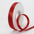 Vibrant red 1cm satin ribbon on a white spool for gift boxes and DIY flower packaging - Red