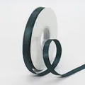 1cm dark green ribbon with gold metallic glitter weave on a white spool for gift wrapping - Dark Green