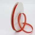 Roll of red 1cm wide ribbon with gold metallic edges for gift wrapping and DIY crafts - Red