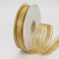 Champagne gold organza ribbon with three gold glitter stripes on a white roll - Gold