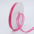Rose red 1cm wide sheer chiffon ribbon with gold metallic edge on a white spool - Dark Rose Red