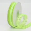 Light green organza ribbon with gold metallic edges on white spool for floral DIY crafts - Fluorescent Green