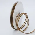 Coffee brown sheer chiffon ribbon with gold metallic edges on a white plastic spool - Khaki