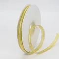 1cm golden striped mesh ribbon on a white spool for DIY hair accessories and gift wrapping - Light gold