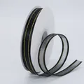 Schwarzes Organzaband mit goldenen Metallkanten auf Rolle für DIY-Haarschmuck - Schwarz Goldrand Stil
