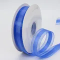 Navy blue 2.5cm mesh organza ribbon with satin edges on a white spool for DIY gift wrapping - Sapphire Blue