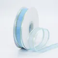 Light blue 2.5cm chiffon ribbon with gold metallic edges on a white plastic spool - Light Blue Gold Edge