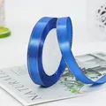 Dark blue satin ribbon with gold stitched edges for gift wrapping and DIY crafts - Sapphire Blue