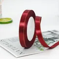Roll of 1.2cm burgundy satin ribbon with gold edges for luxury gift packaging - Burgundy