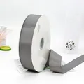 Roll of grey grosgrain ribbon with dense rib texture for gift and cake packaging - Gray