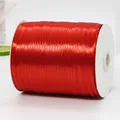 Vibrant red polyester satin ribbon roll on a white spool for wedding gift packaging - Ultra Thin Large Capacity Bright Red Ribbon