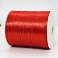 Vibrant red polyester satin ribbon roll for festive wedding and gift packaging - Ultra Long Thin Bright Red Ribbon