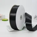 Single roll of black satin ribbon on a white spool for gift wrapping and DIY crafts - Large Extra Long Paper Core Roll (BH-44)