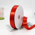Vibrant red polyester satin ribbon roll with smooth glossy finish for gift wrapping - Extra Wide Long Red Ribbon Style
