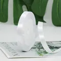 Single roll of glossy white satin ribbon for gift wrapping and DIY crafts decor - White