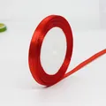 Roll of 6mm red satin ribbon with glossy finish for gift wrapping and DIY crafts - Thin Red Ribbon