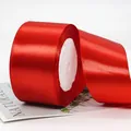 Vibrant red satin ribbon roll with smooth finish for festive gift wrapping and DIY crafts - Super Wide Bright Red Ribbon