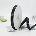 Black 1.5cm wide satin ribbon roll with smooth glossy finish for gift packaging - Slim Long Paper Core Roll (BH-44)