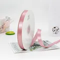 Roll of 1cm light pink single face satin ribbon for gift wrapping and floral bouquets - 1.5cm x 91m / Dusty Pink