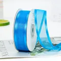 Bright blue chiffon ribbon roll with satin edges for gift wrapping and floral decoration - Teal