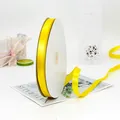 Glossy yellow satin ribbon on roll for gift wrapping and wedding flower decoration - Satin Style / Gold Yellow