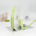 Nastro canneté verde pallido 1.5cm su bobina per confezioni regalo e fai da te - Verde chiaro