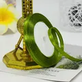 Roll of emerald green ribbon with gold trim for gift wrapping and wedding favors - 95# Army Green